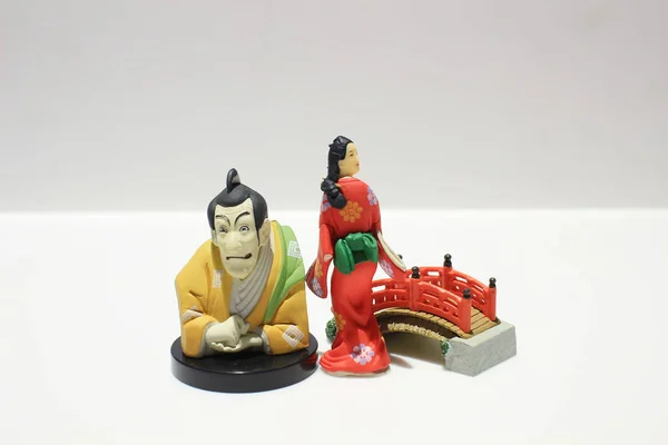 model of japan style figure at the board