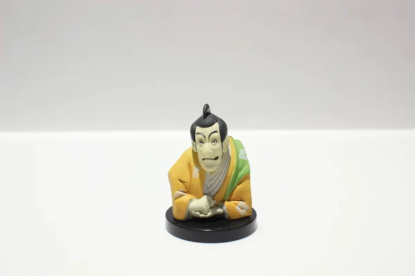 Modelo de la figura de estilo japonés en el tablero — Foto de Stock