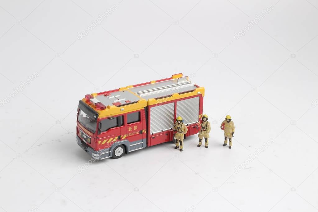 fun of  Figure of a Fireman and  truck