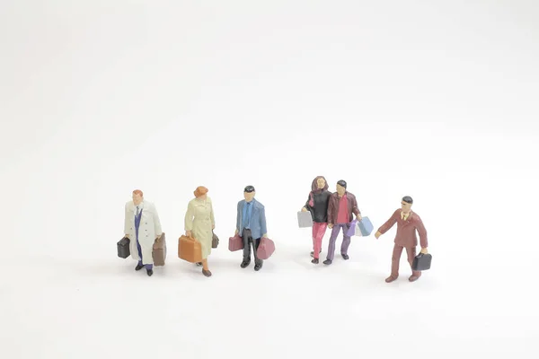 Un concepto de viaje mini figura con equipaje — Foto de Stock