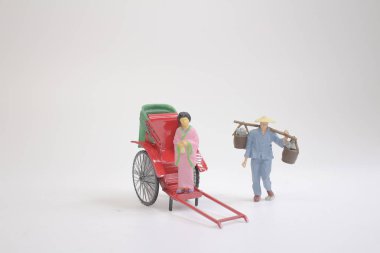 heykel ve kırmızı vintage oryantal çekçek taksi