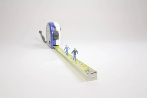 The Tape of measure with running figure — Stock Photo, Image
