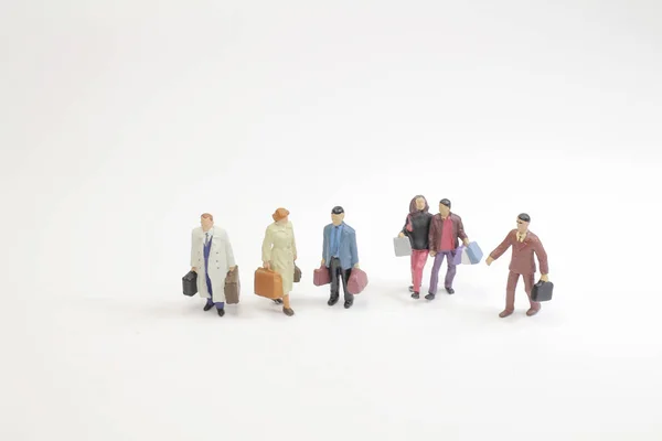 Un concepto de viaje mini figura con equipaje — Foto de Stock