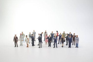 Mini iş kavramı: iş adamları el sallamak