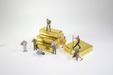 Altın hareketli bir işçi şekil, 