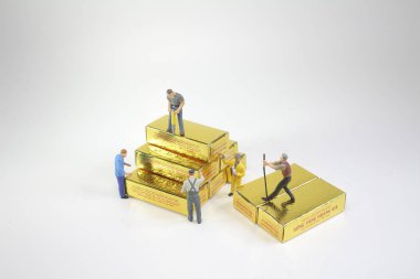 Altın hareketli bir işçi şekil, 