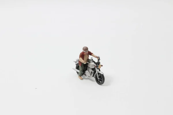 Mini Figuur Motorcross op de witte achtergrond — Stockfoto