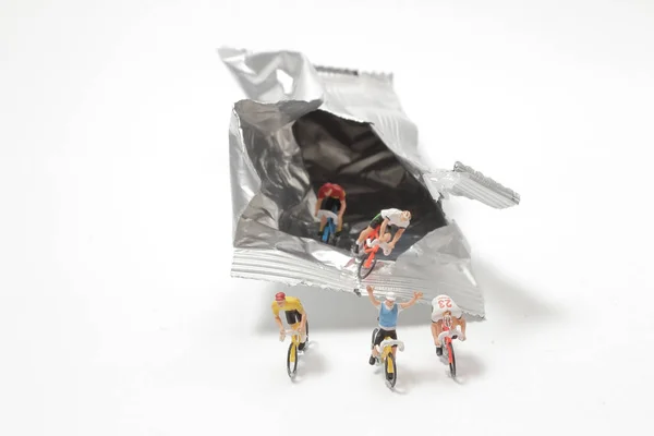 Mini bike figure ride from the Foil Package Bag — стоковое фото