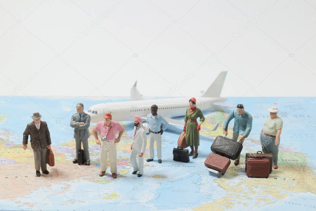 a mini Business Travelers Standing On A Map