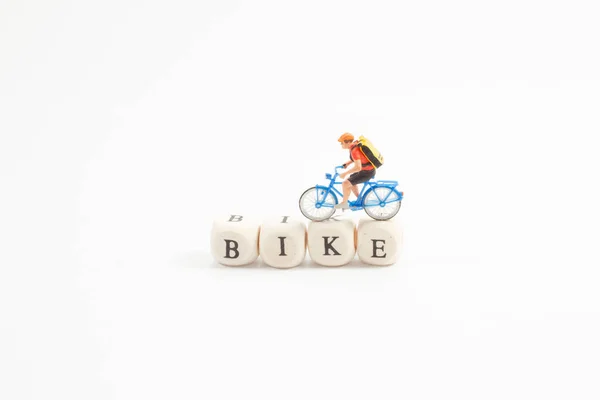 The wooden cubes of bike with the figure — Stock Photo, Image