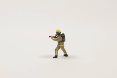 İtfaiyeci oyuncağı. Tahtadaki figür..