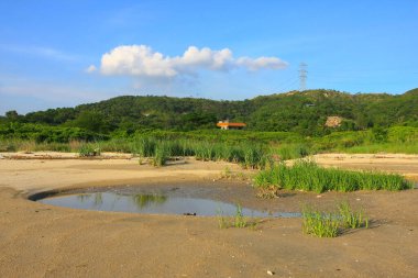 21 Haziran 2008 'de Pak Nai bataklıklarında güneş battı. Hong Kong.