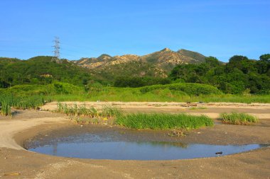 21 Haziran 2008 'de Pak Nai bataklıklarında güneş battı. Hong Kong.