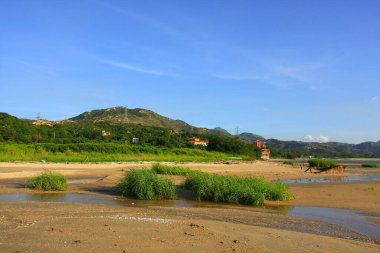 21 Haziran 2008 'de Pak Nai bataklıklarında güneş battı. Hong Kong.