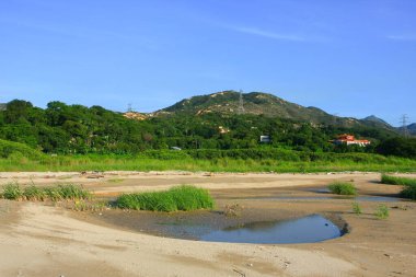 21 Haziran 2008 'de Pak Nai bataklıklarında güneş battı. Hong Kong.