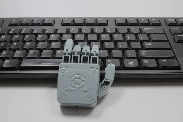 Scale Big Robot Hand Type Keyboard — Stock Photo, Image
