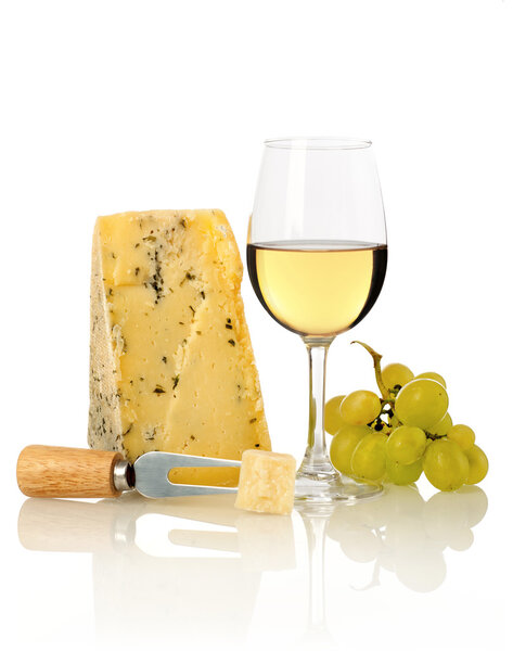 Wine glass, grapes and cheese