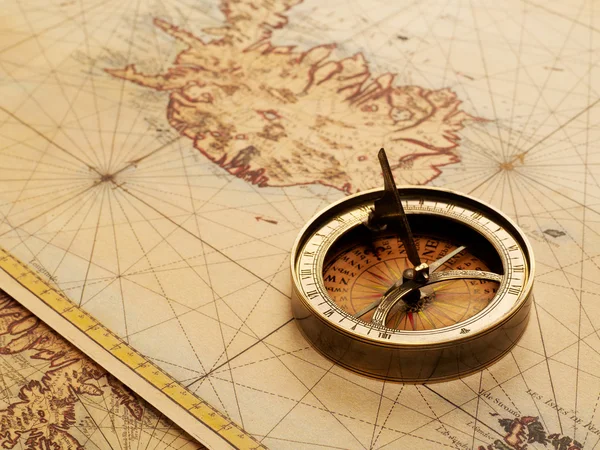 Old compass and ancient map Royalty Free Stock Images