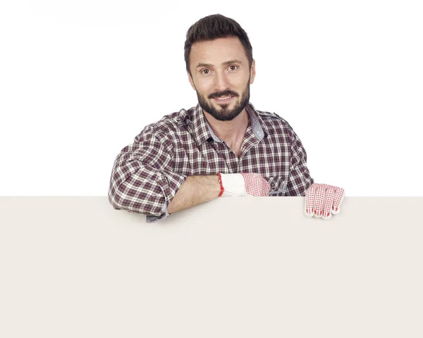 Handyman with blank board — Stock Photo, Image