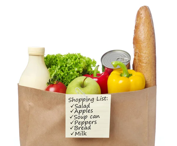 食料品の袋に買い物リスト — ストック写真