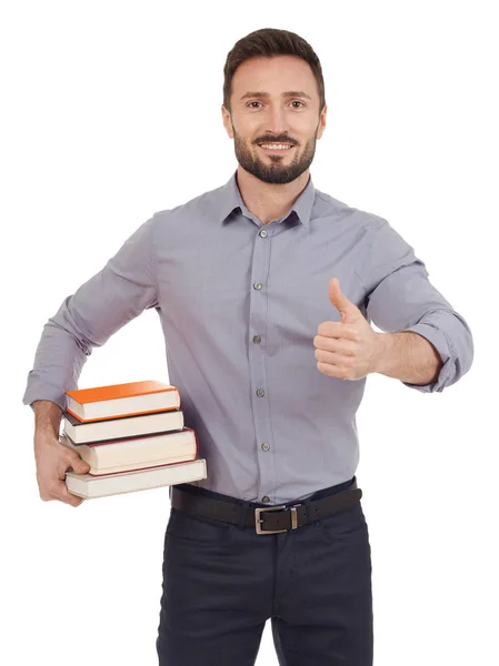 Uomo con pila di libri — Foto Stock