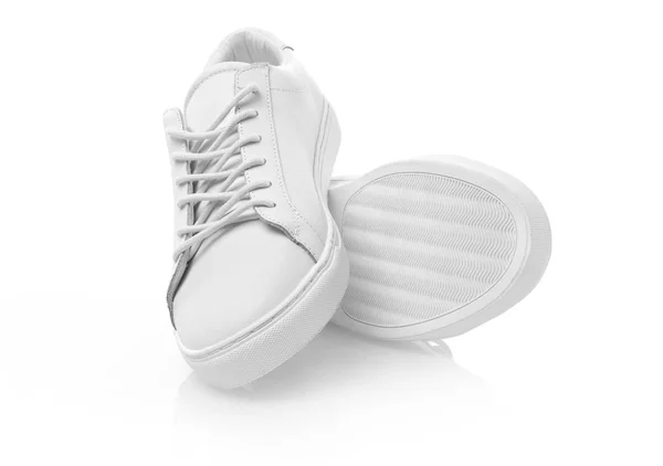 Біле взуття на білому — стокове фото