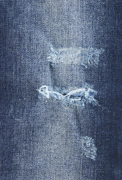 Detalhe de jeans rasgado — Fotografia de Stock