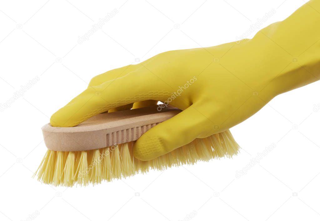 Hand with cleaning brush