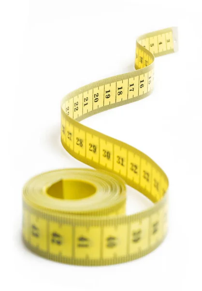 Fita métrica amarela em branco — Fotografia de Stock