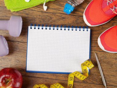 Defter ve fitness ekipmanları