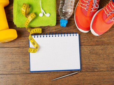Defter ve fitness ekipmanları