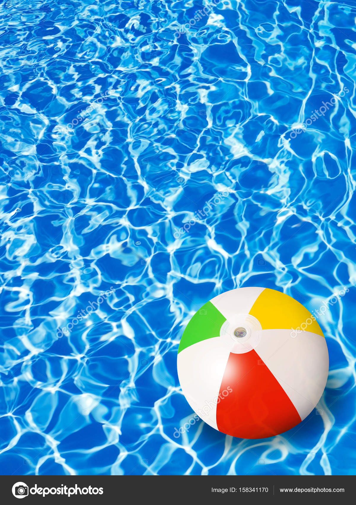 Beach ball in the water — Stock Photo © Goir 158341170