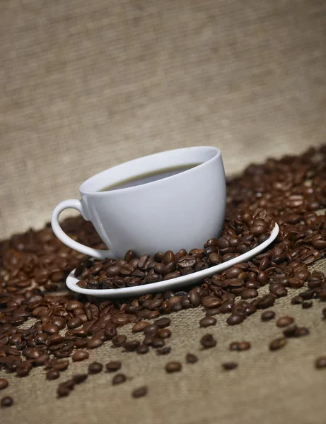 Tazza di caffè su uno sfondo rustico — Foto Stock