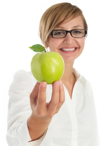 Cheerful woman holding an apple — Stock Photo, Image