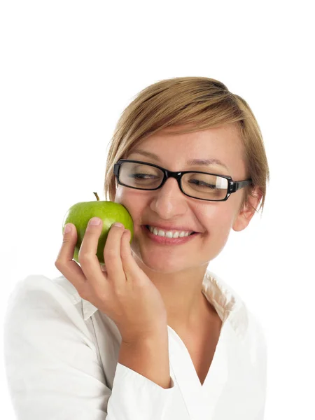 Cheerful woman holding an apple — Stock Photo, Image