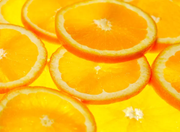 Apelsinskivor bakgrund — Stockfoto
