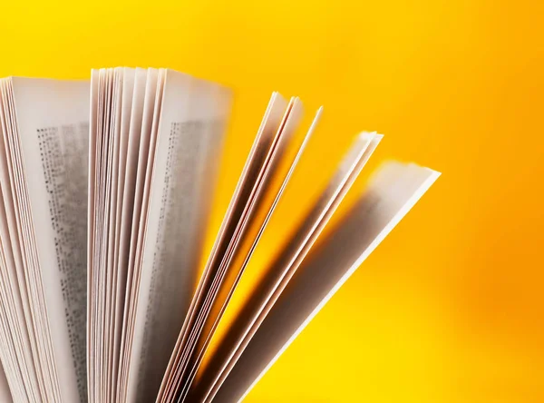 Pages close-up on yellow — Stock Photo, Image