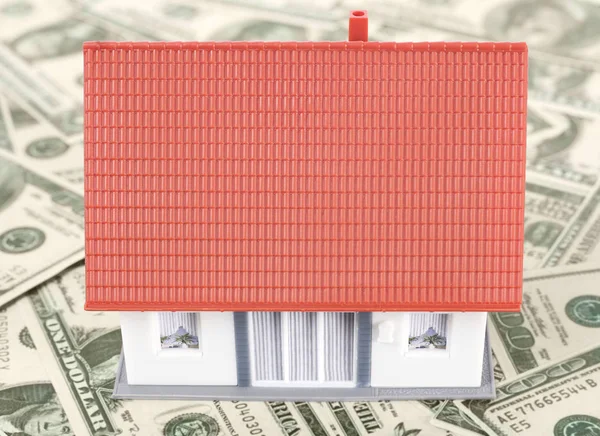 Modèle de maison sur dollars — Photo