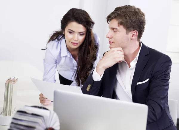 Business co-workers at the office — Stock Photo, Image