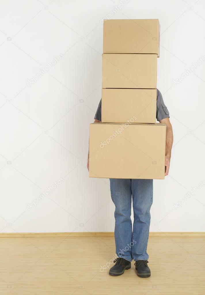 Man behind moving boxes