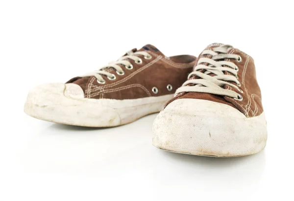 Zapatillas de deporte viejas en blanco —  Fotos de Stock