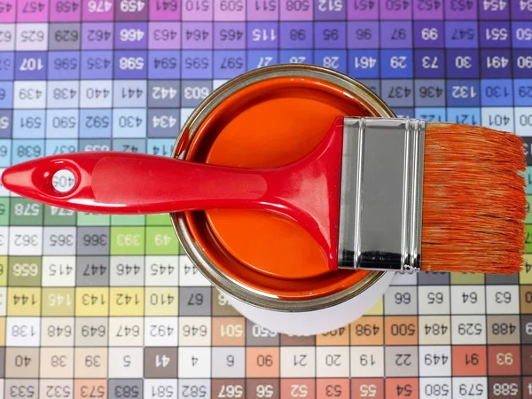 Paint can, paint brush and color swatch — Stock Photo, Image