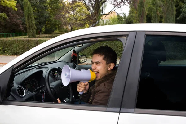 Angry driver with megaphone