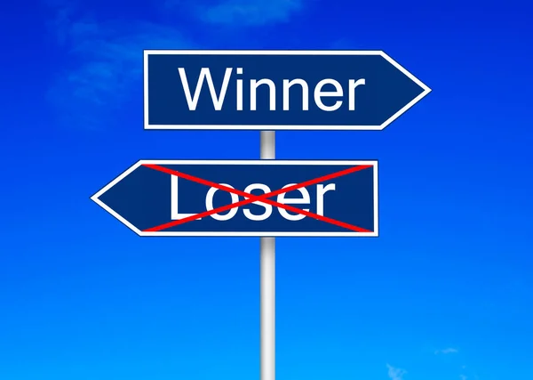 Kazanan vs daha gevşek yol işareti — Stok fotoğraf