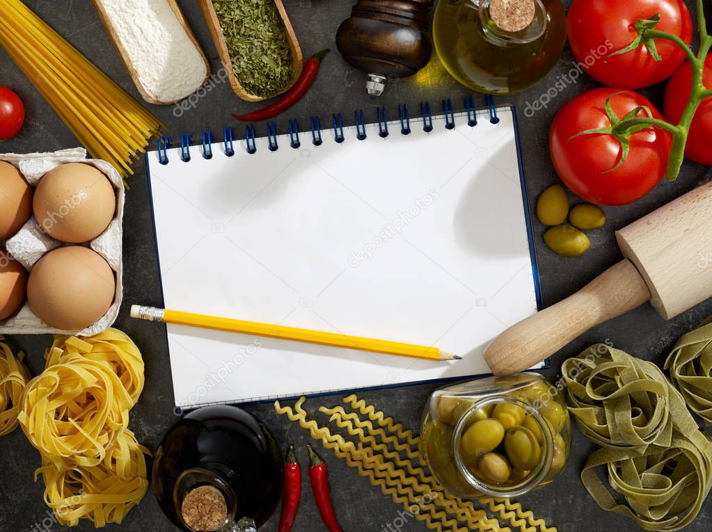 Notebook, pasta and ingredients