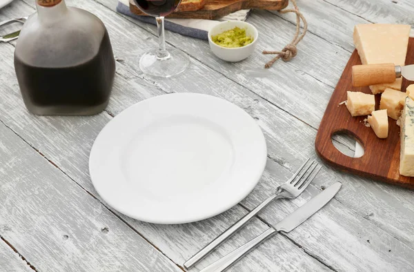 Empty plate on dinner table