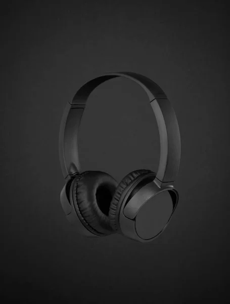 Headphones on black background — Stock Photo, Image