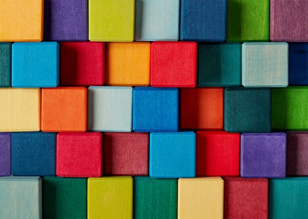 Multi-colored toy cubes background — 스톡 사진