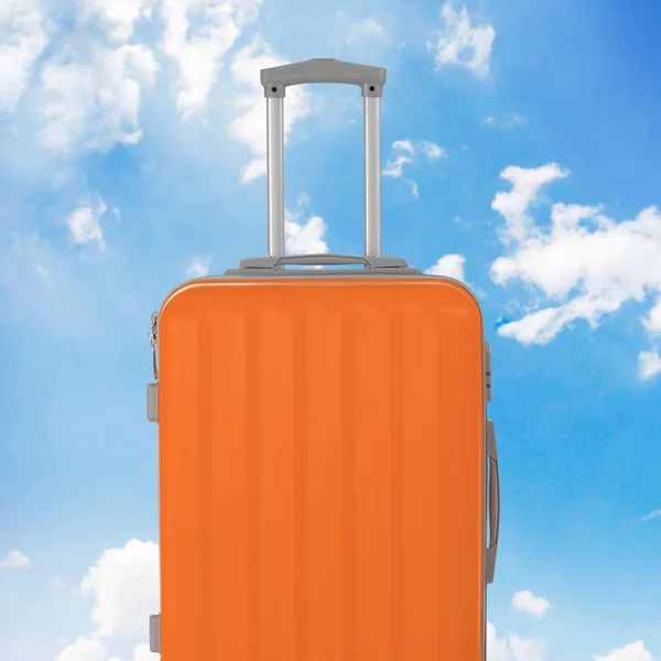 Orange luggage close-up, sky background — 스톡 사진