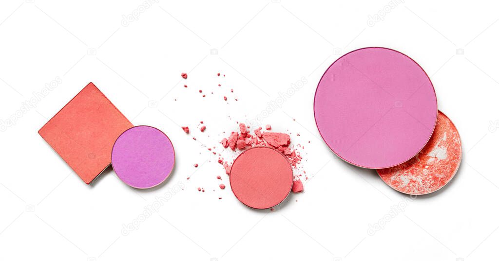 Makeup powders variety on white background